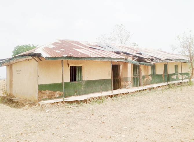 In Abuja school, pupils sit on bare floor, teachers on window