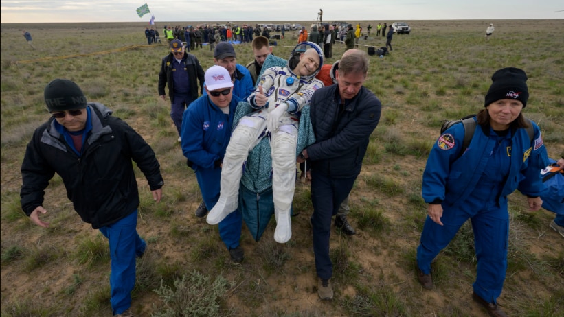 NASA astronaut celebrates 70th birthday with return to Earth