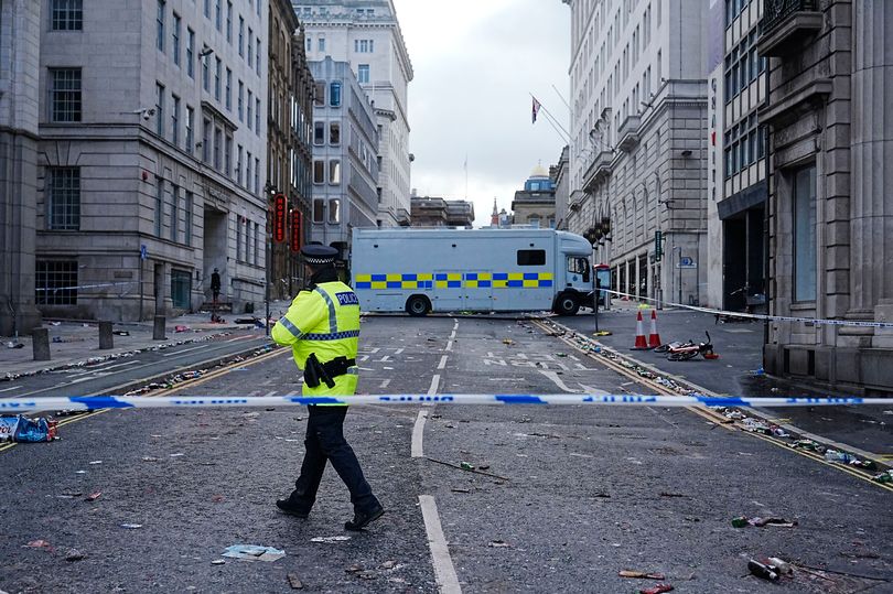 Man held for attempted murder after Liverpool parade crash
