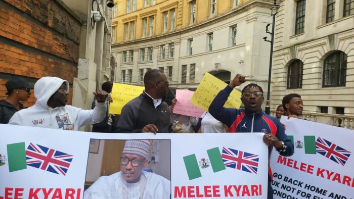 Nigerians protest in London, demand ex-NNPC boss Kyari’s deportation