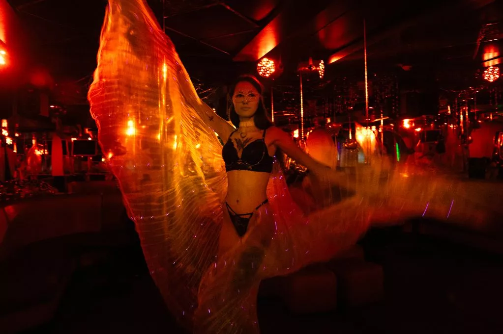 Bombs above, burlesque below: Strip club stays open as war rages in Ukraine