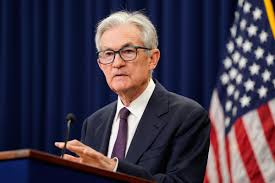 Fed holds interest rates, expects two cuts in 2025 as Powell flags inflation concerns