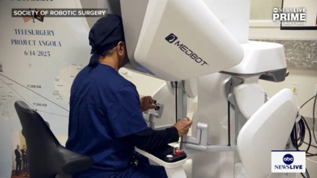Doctor performs remote surgery using robot on patient in Africa
