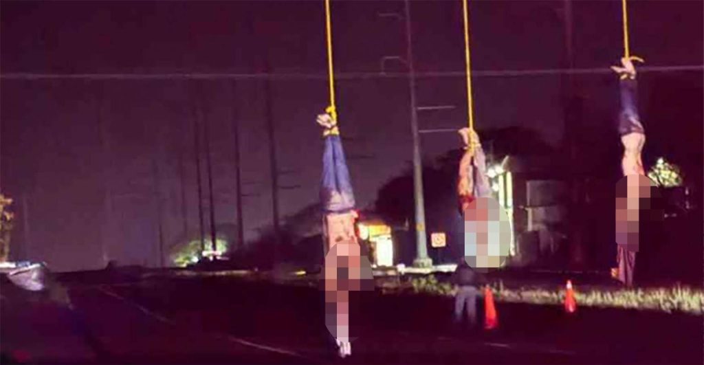 Mexico reels after 20 bodies found in cartel massacre, including 4 headless victims hung from bridge