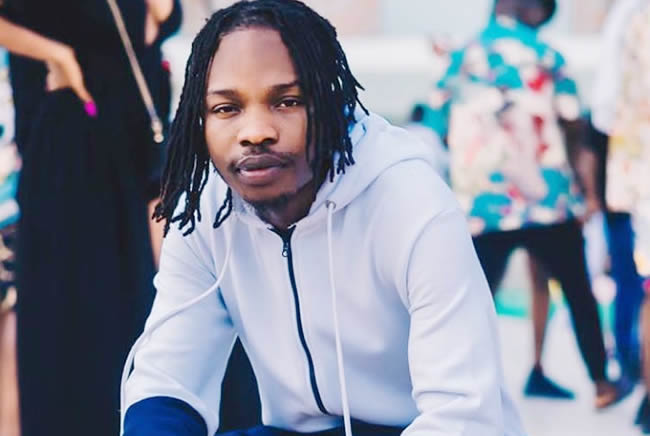 Naira Marley warns youth: “football bet no be work”