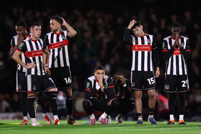 Grimsby punished for fielding ineligible player in Man United cup upset