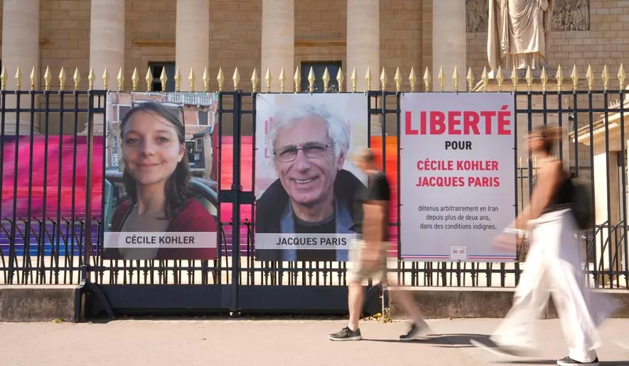 Iran frees French duo after diplomatic talks with Macron