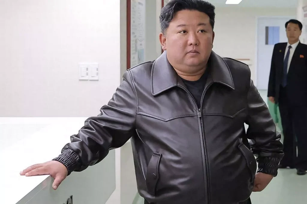 North Korean youths rush for Kim-style coats