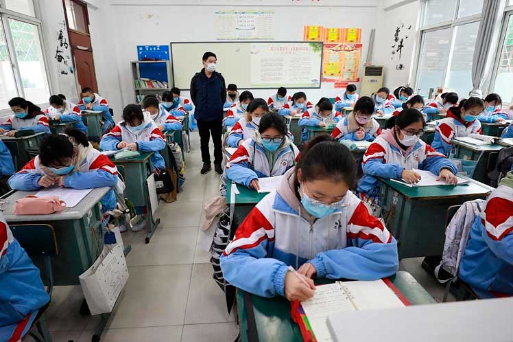 China moves to cut school exams to reduce student academic stress