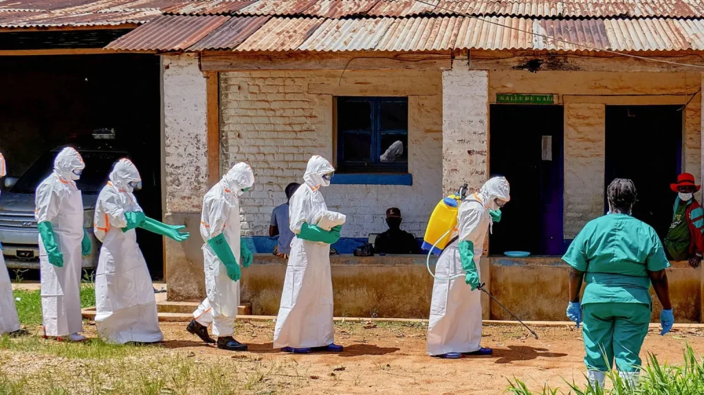 Police fire shots in air to disperse angry crowds at DR Congo Ebola treatment centre Police fire shots in air to disperse angry crowds at DR Congo Ebola treatment centre