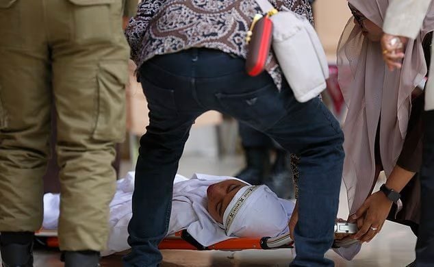 Woman collapses after 100 lashes for extramarital sex under Indonesia’s Sharia law