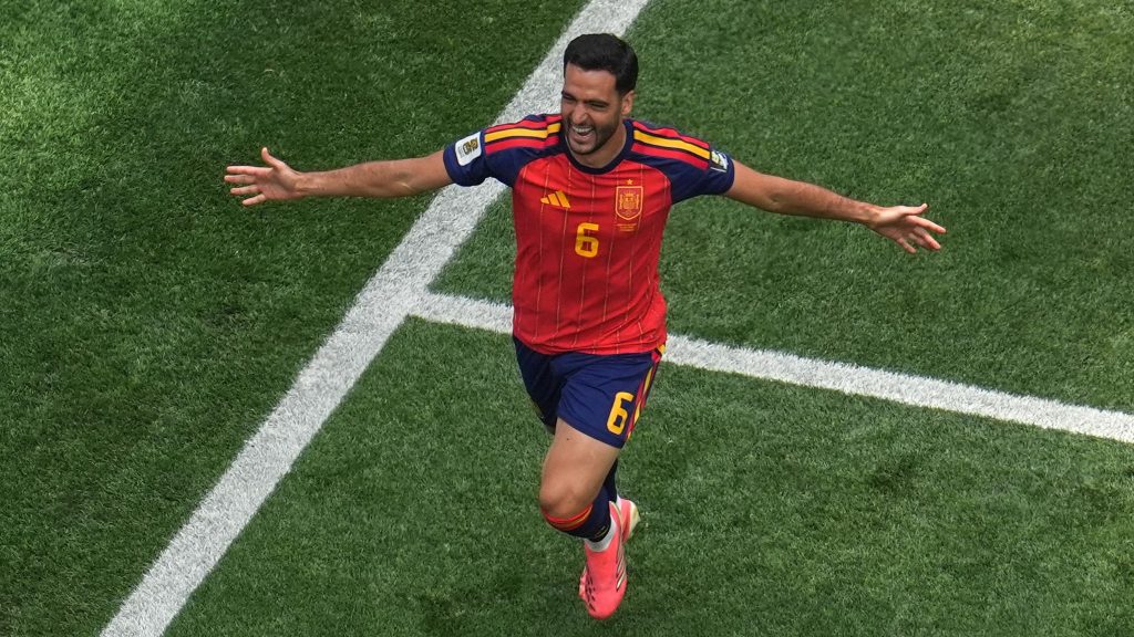 Spain beats Belgium 2-1 to reach World Cup semi-finals